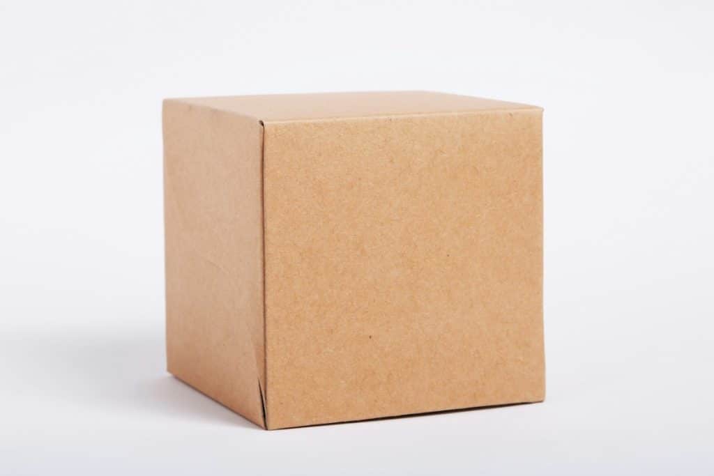 Brown cardboard shipping box on a light background