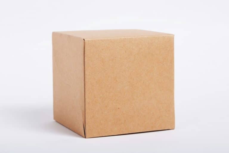Brown cardboard shipping box on a light background